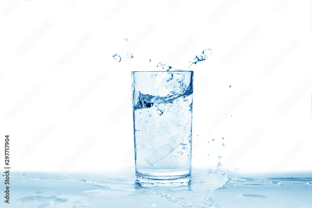 Water splashes in a glass of water isolated white background, copy space