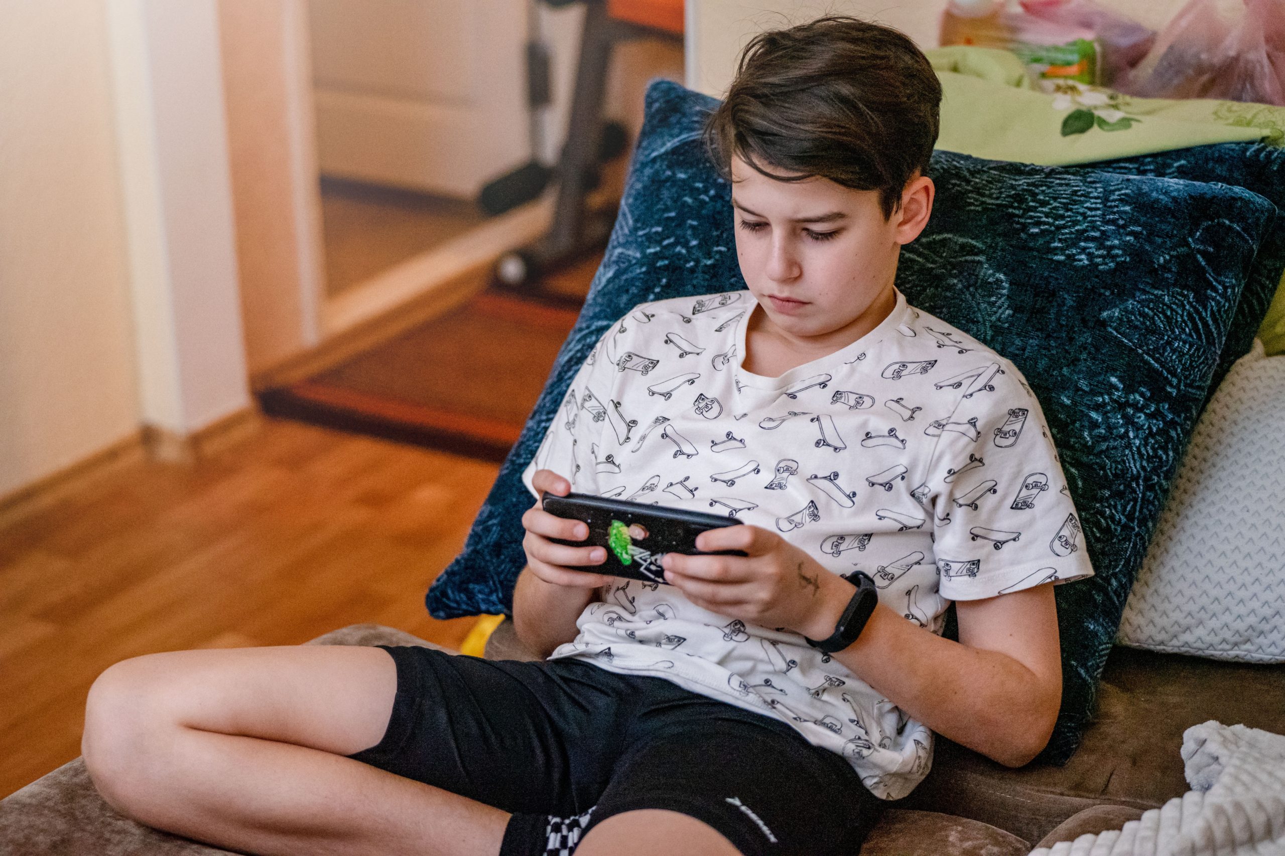 teenager, video game, indoors